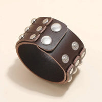 A wide brown leather cuff bracelet with silver-tone metal studs and snap closures, Handmade Multi-Layer Genuine Leather Fashion Bracelet for Unisex Punk Rivet Cowhide Bracelet