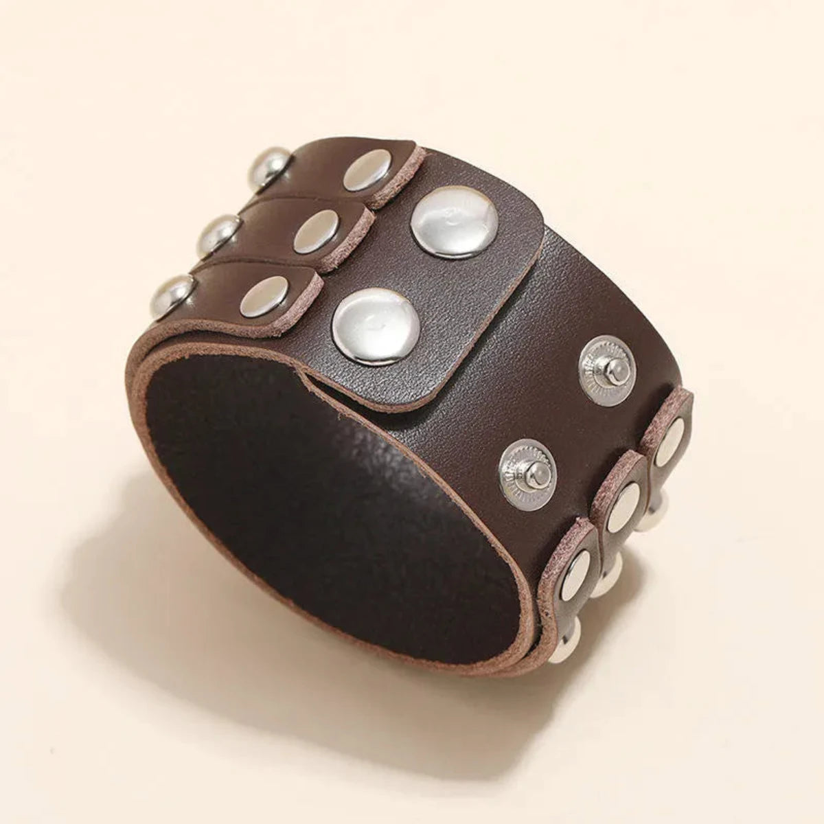 A wide brown leather cuff bracelet with silver-tone metal studs and snap closures, Handmade Multi-Layer Genuine Leather Fashion Bracelet for Unisex Punk Rivet Cowhide Bracelet