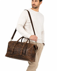 Large leather travel bag with shoulder strap