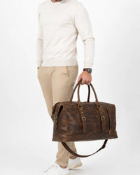 Vintage brown leather weekender travel bag