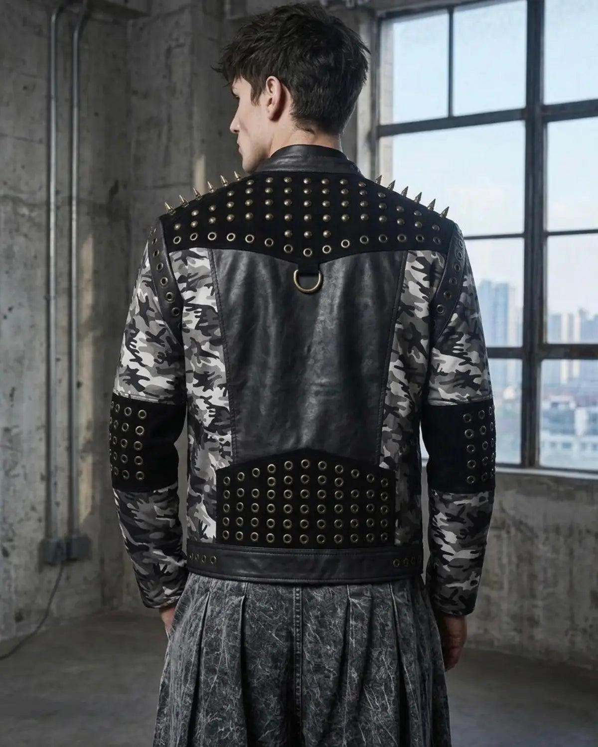 Person wearing a studded leather jacket in an urban setting