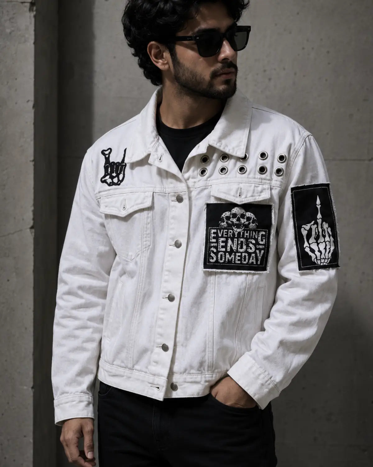 Handmade white denim men's jacket with printed graphic patches and gothic details
