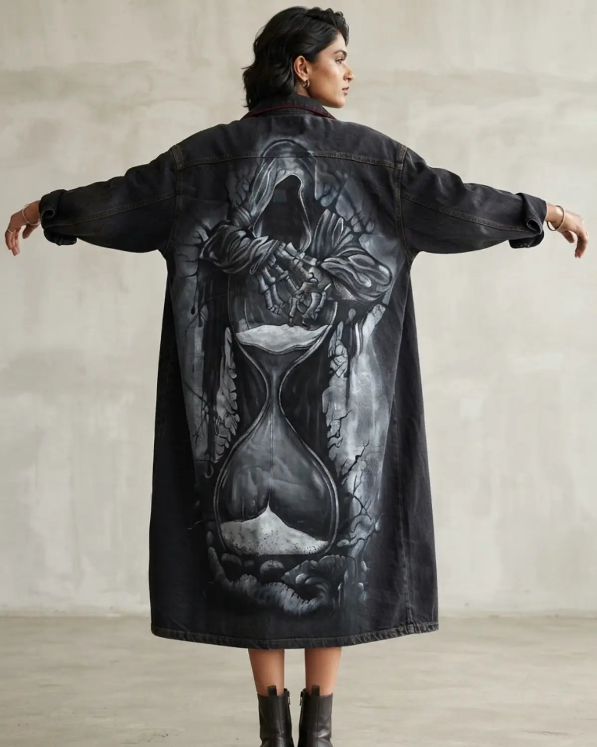 Long oversized unisex denim dress with hand-painted hooded figure and hourglass artwork
