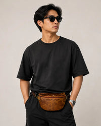Brown leather waist pack for travel and everyday use