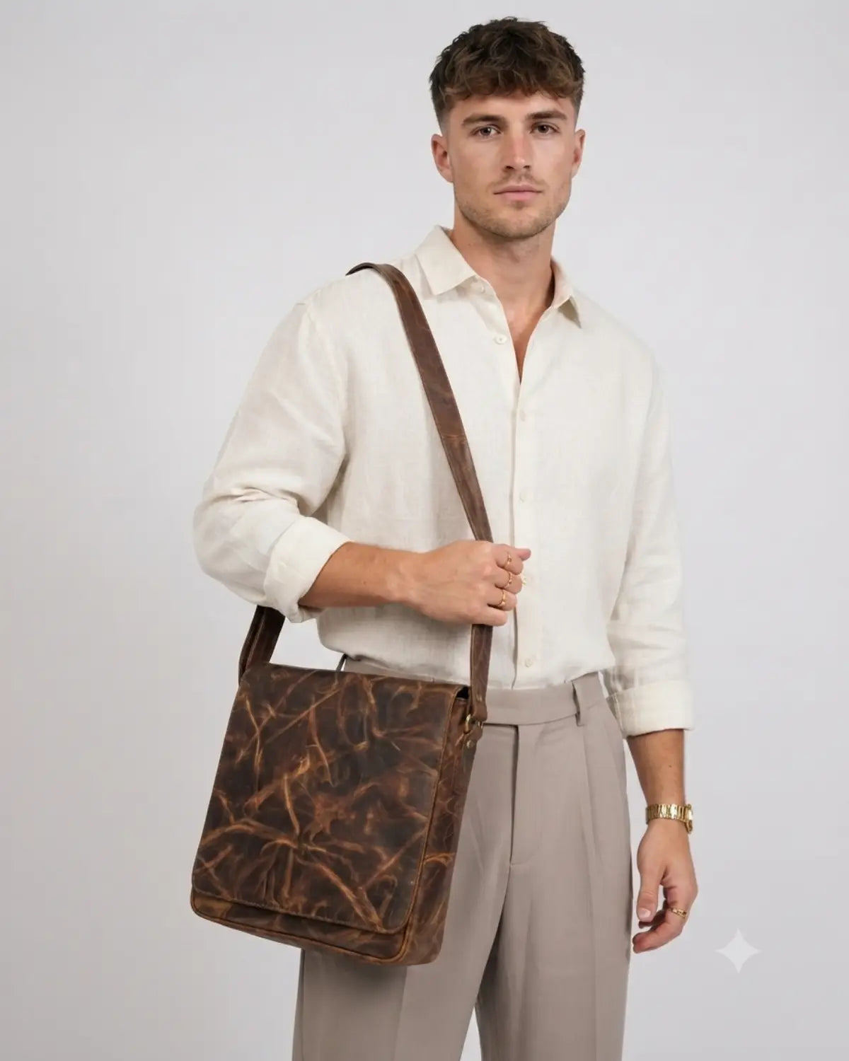 Buff crunch leather messenger crossbody bag with front zipper pocket