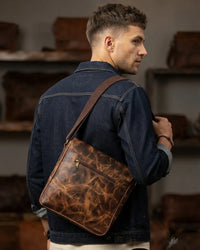 Buff crunch leather messenger crossbody bag with front zipper pocket