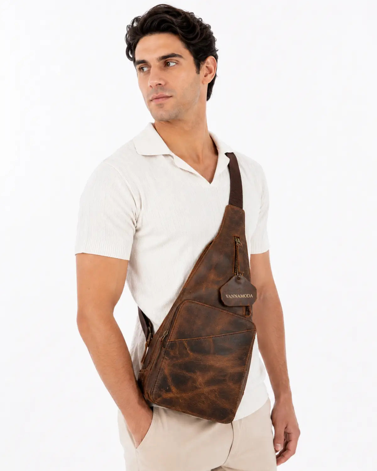 Brown leather crossbody bag with zipper pockets